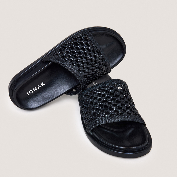 Openwork mules in black leather | WOZART
