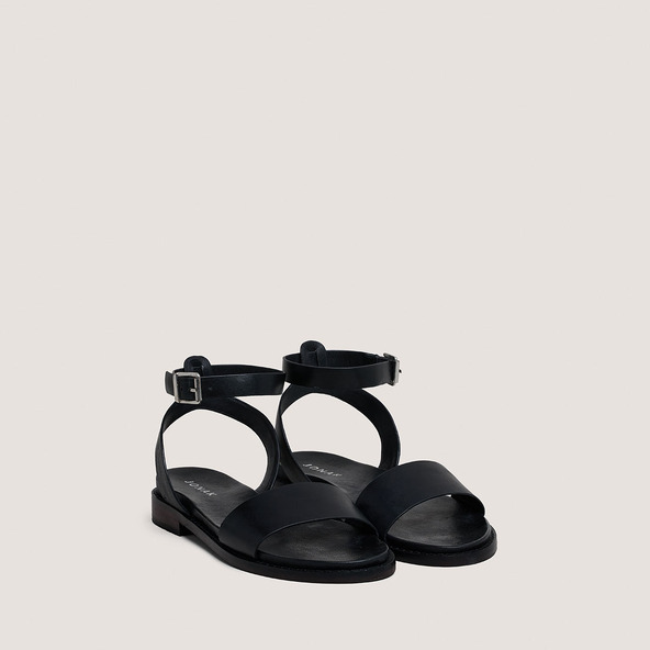 Sandals with straps and adjustable buckles in black leather | WIK