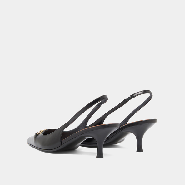 Pumps with gold bits in black leather | DATURA