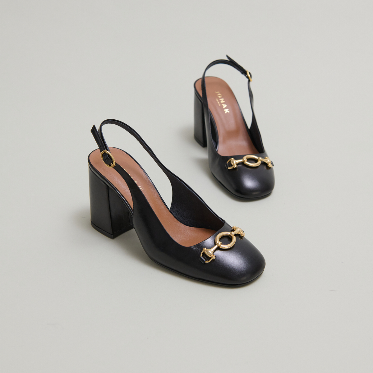 Slingback pumps in black leather | DECOUV