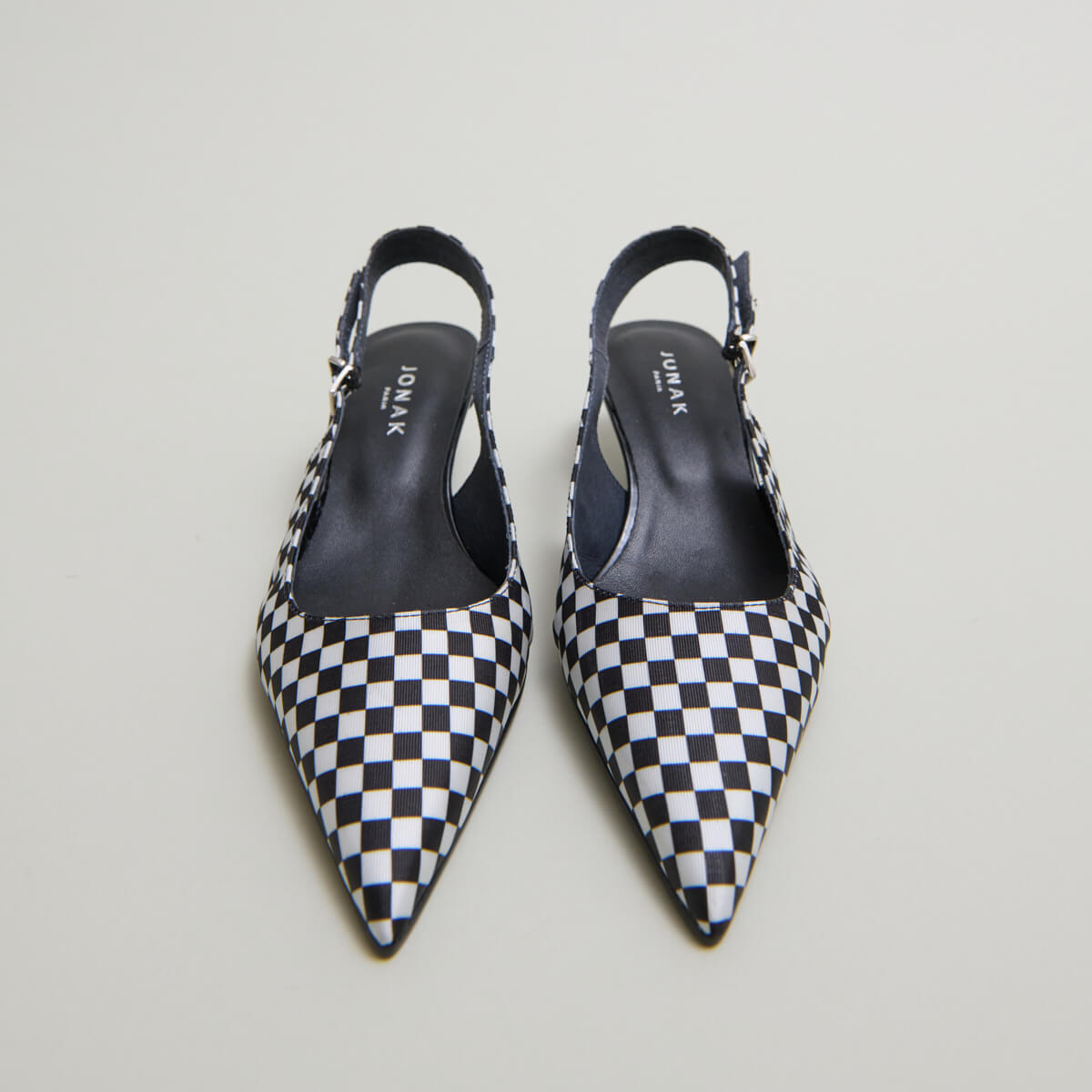 Heeled pumps with adjustable buckles in black and white textile | DOUALA