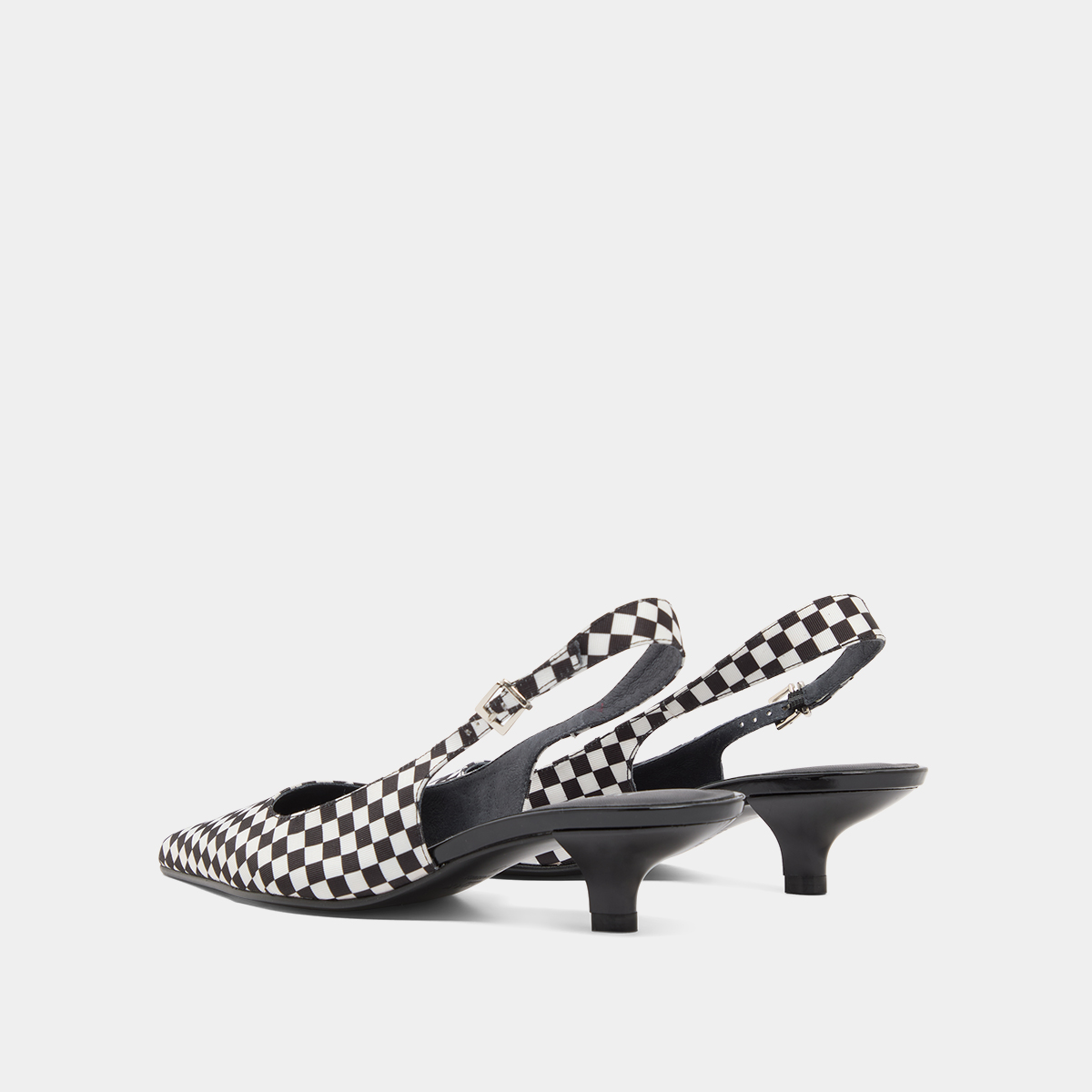 Heeled pumps with adjustable buckles in black and white textile | DOUALA