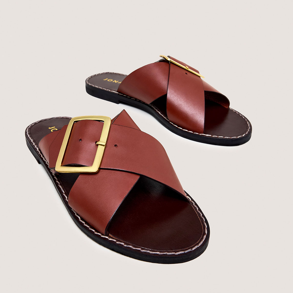 Cross-strap plagettes in cognac leather | WILA