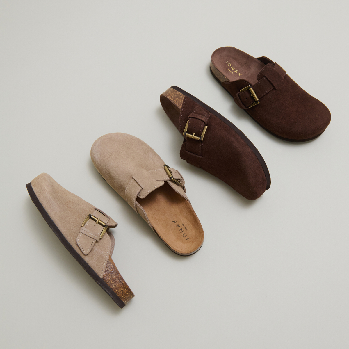 Mules with buckles in brown crust | MUNCH