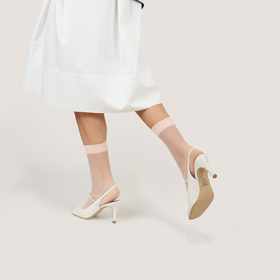 Heeled slingbacks in pearl varnish | discret
