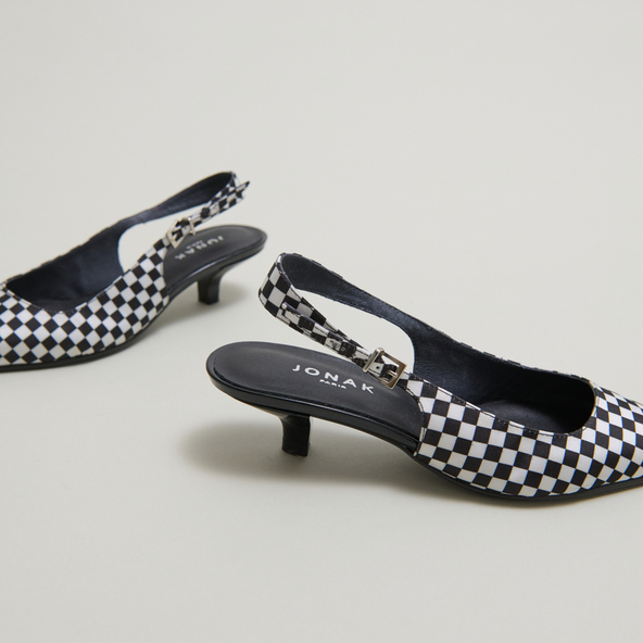 Heeled pumps with adjustable buckles in black and white textile | DOUALA