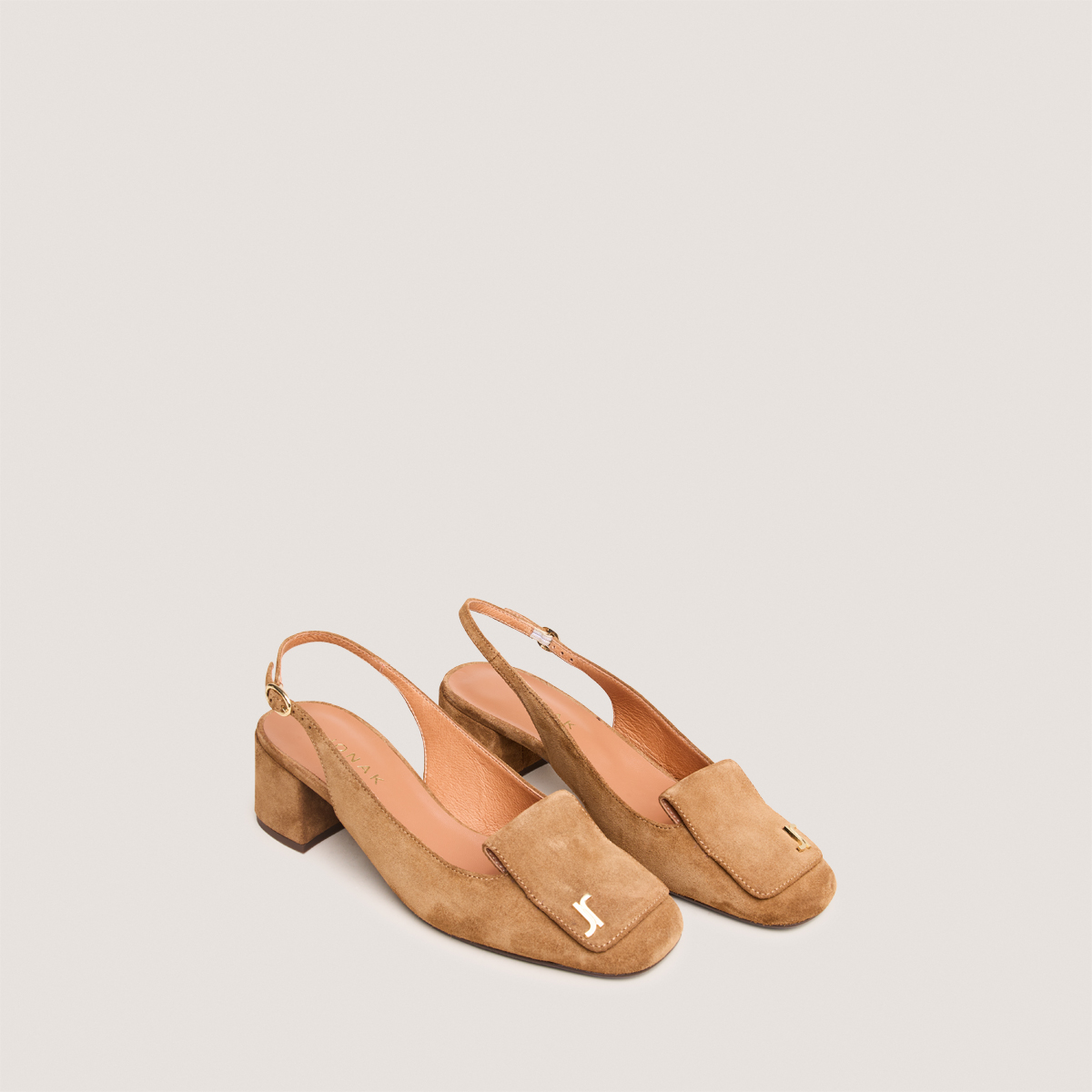 Monogrammed slingback pumps in cognac suede | DAIKI