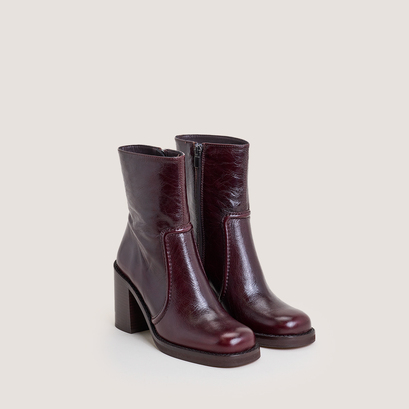 High-heel platform booties in aged chocolate leather | benicio