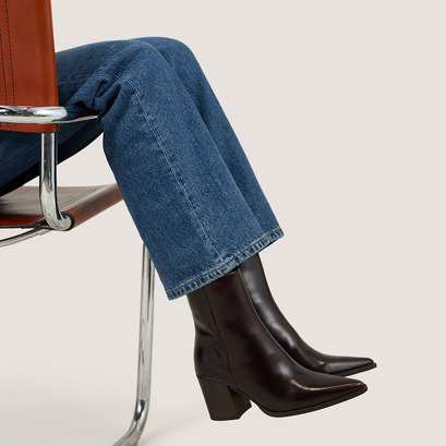 Heeled ankle boots in dark brown patinated leather | pride