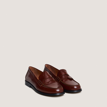 Penny loafers with raised soles in brown glazed leather | audelya