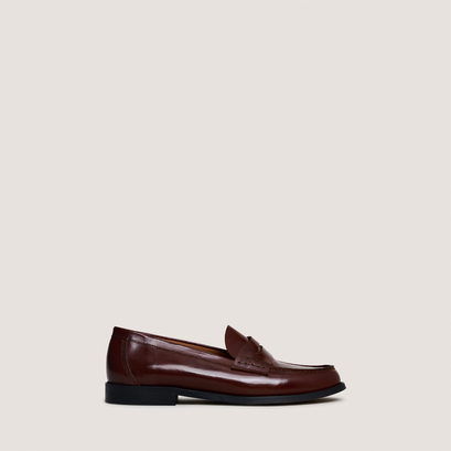 Penny loafers with raised soles in brown glazed leather | audelya