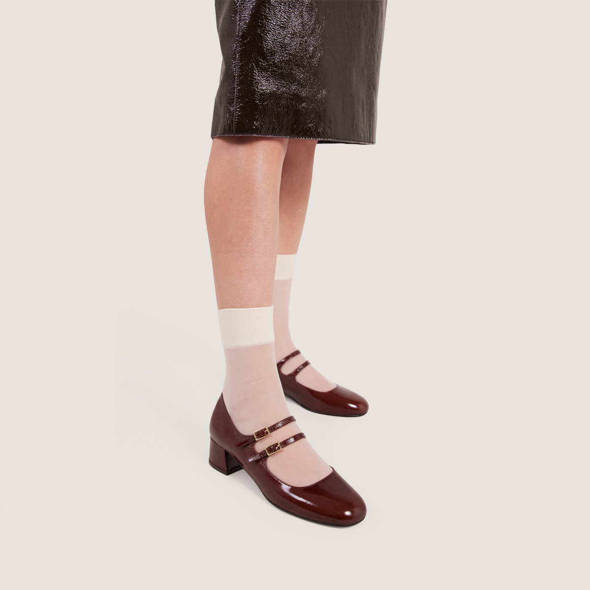 Mary Janes with double straps in shiny brown leather | DUNY
