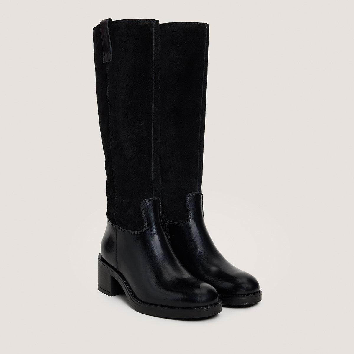 Heeled boots in black leather and suede | CLAIRE