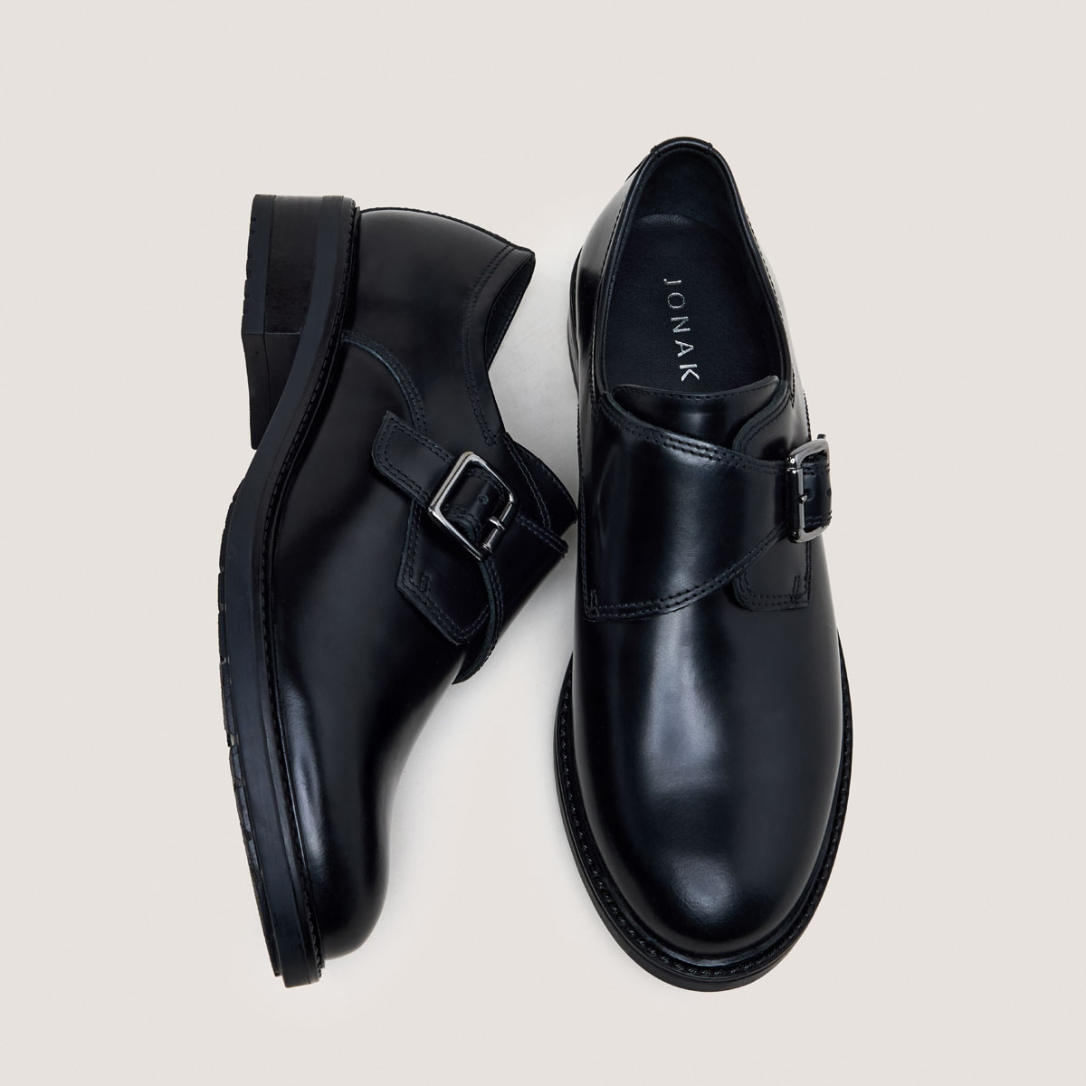 Buckle derbies in glazed black leather | ATLANTIS