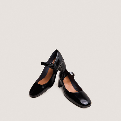 Heeled mary janes in pleated black patent leather | dittus