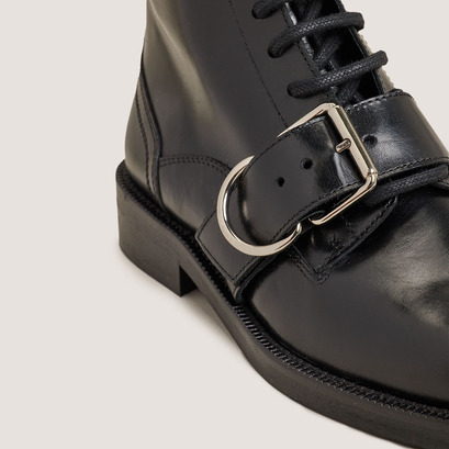 Lace-up boots with buckles in black leather | disabelle