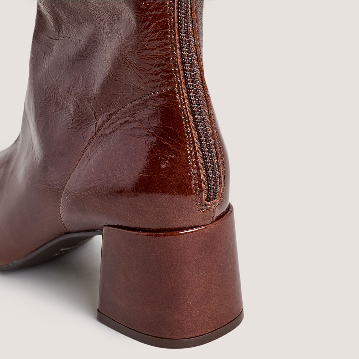 Square-toe boots in brown distressed leather | ARGENTINE