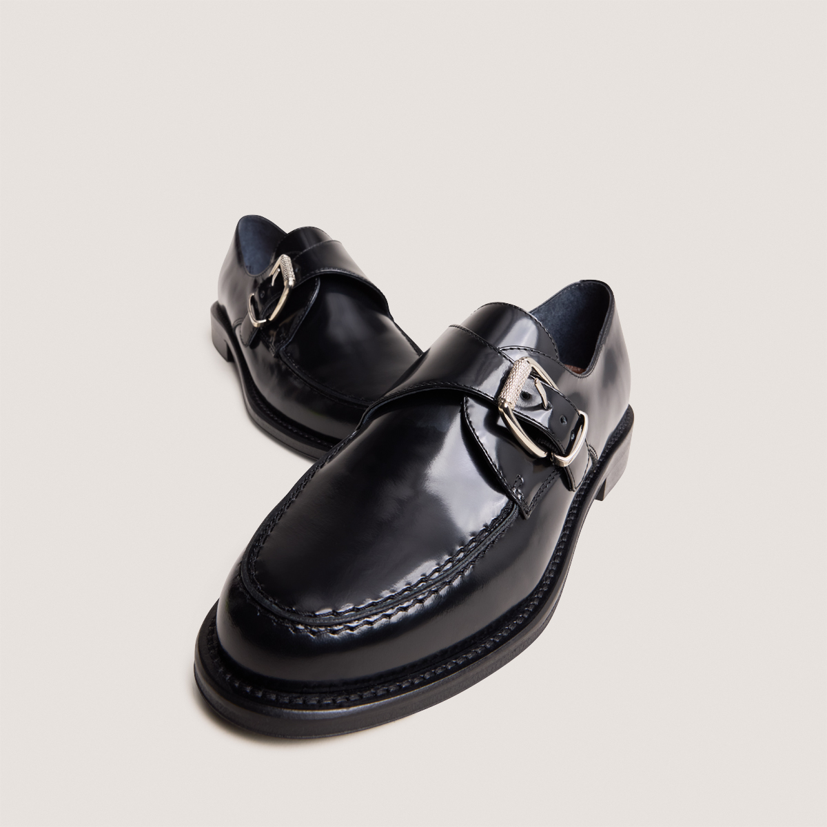 Buckle loafers in black glazed leather | DIXA