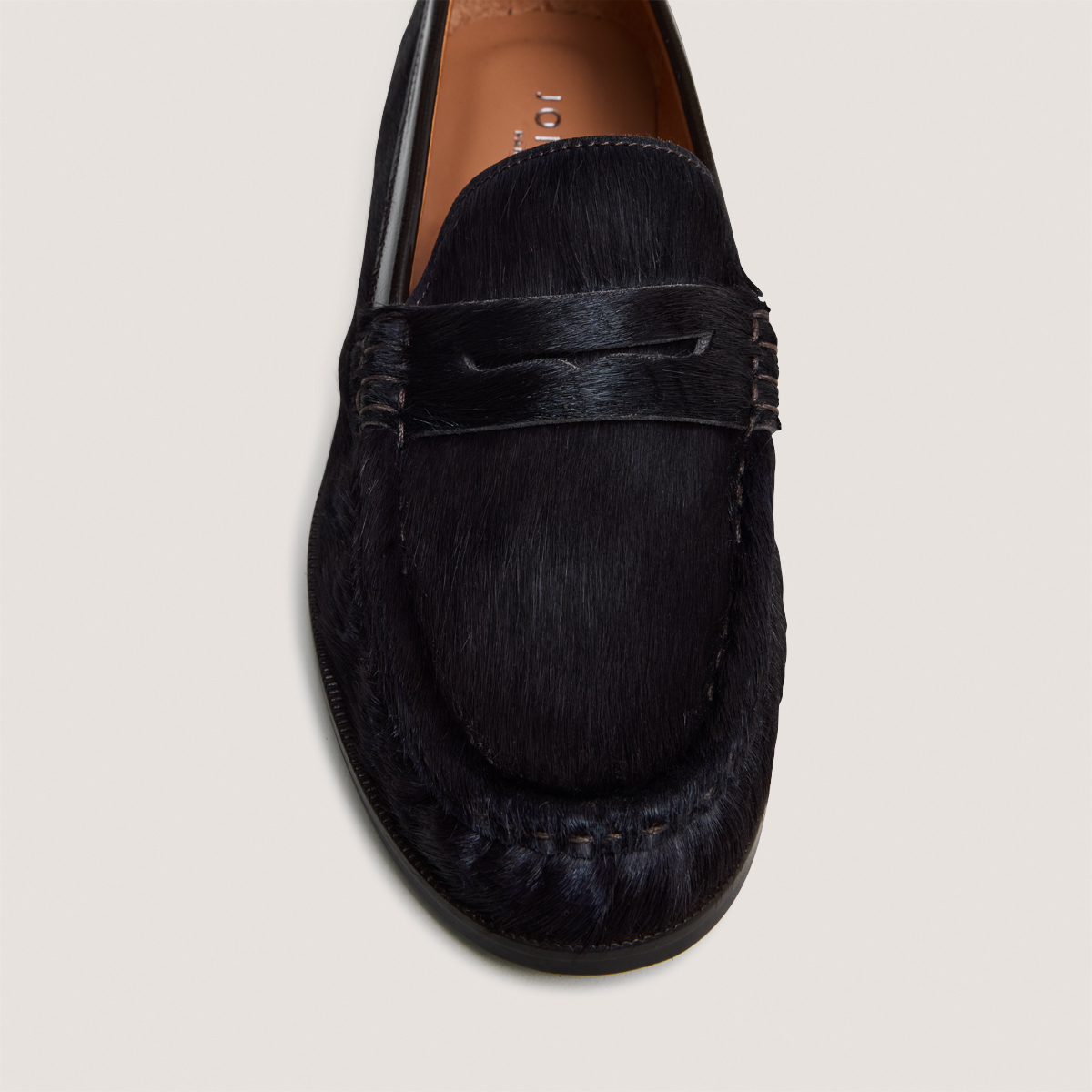 Almond-toe loafers in dark brown cowhide pony hair | DELICE