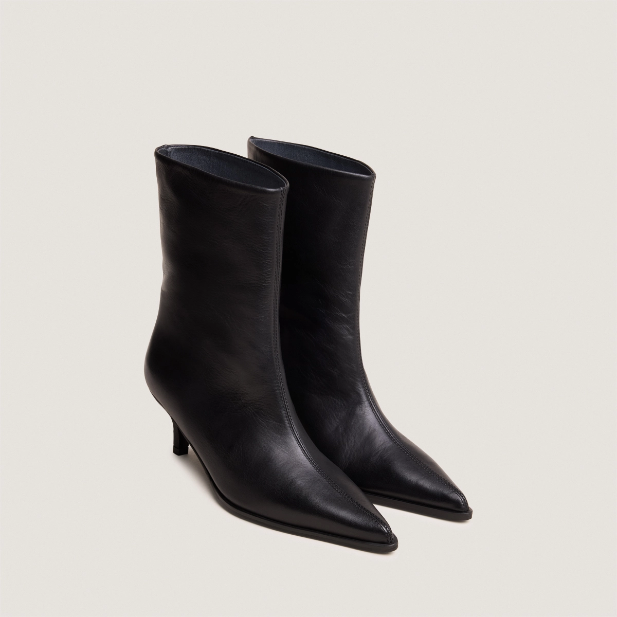 Low Thin-Heeled Pointed-Toe Ankle Boots in soft black leather | DELANIE