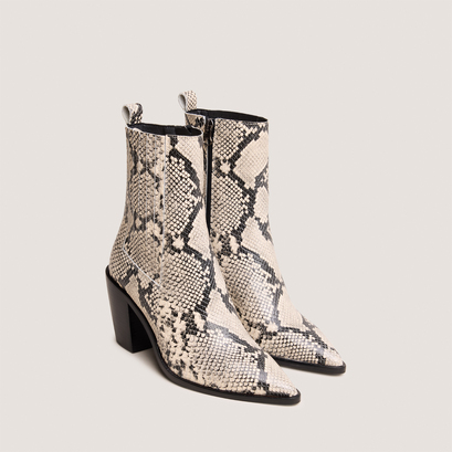 Heeled ankle boots with ruching in black and white reptile leather | basama