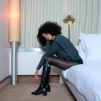 Heeled boots with buckles in black leather and black stretch | AUGUSTINE