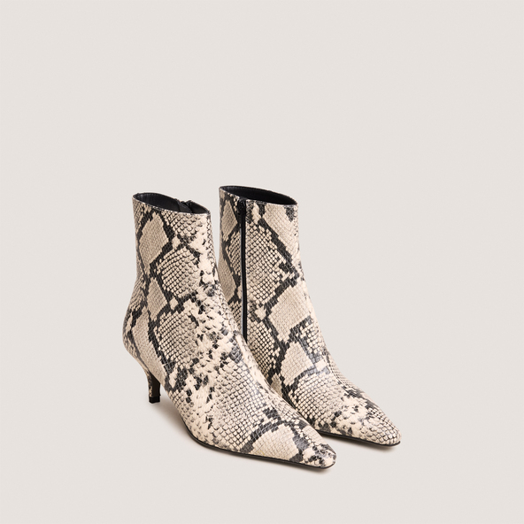 Pointed-toe stiletto-heel ankle boots in black and white reptile leather | BORG