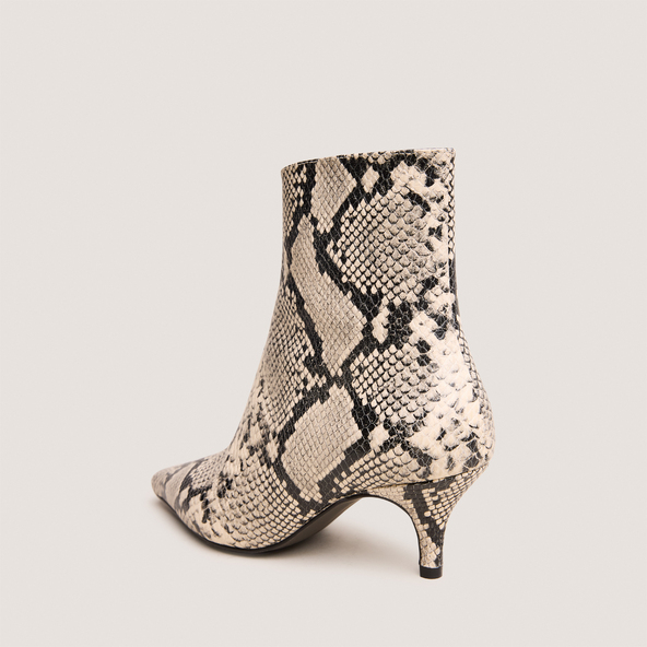 Pointed-toe stiletto-heel ankle boots in black and white reptile leather | BORG
