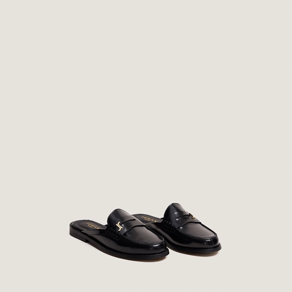 Backless loafers with monogram detailing in black patent leather | AMAURY