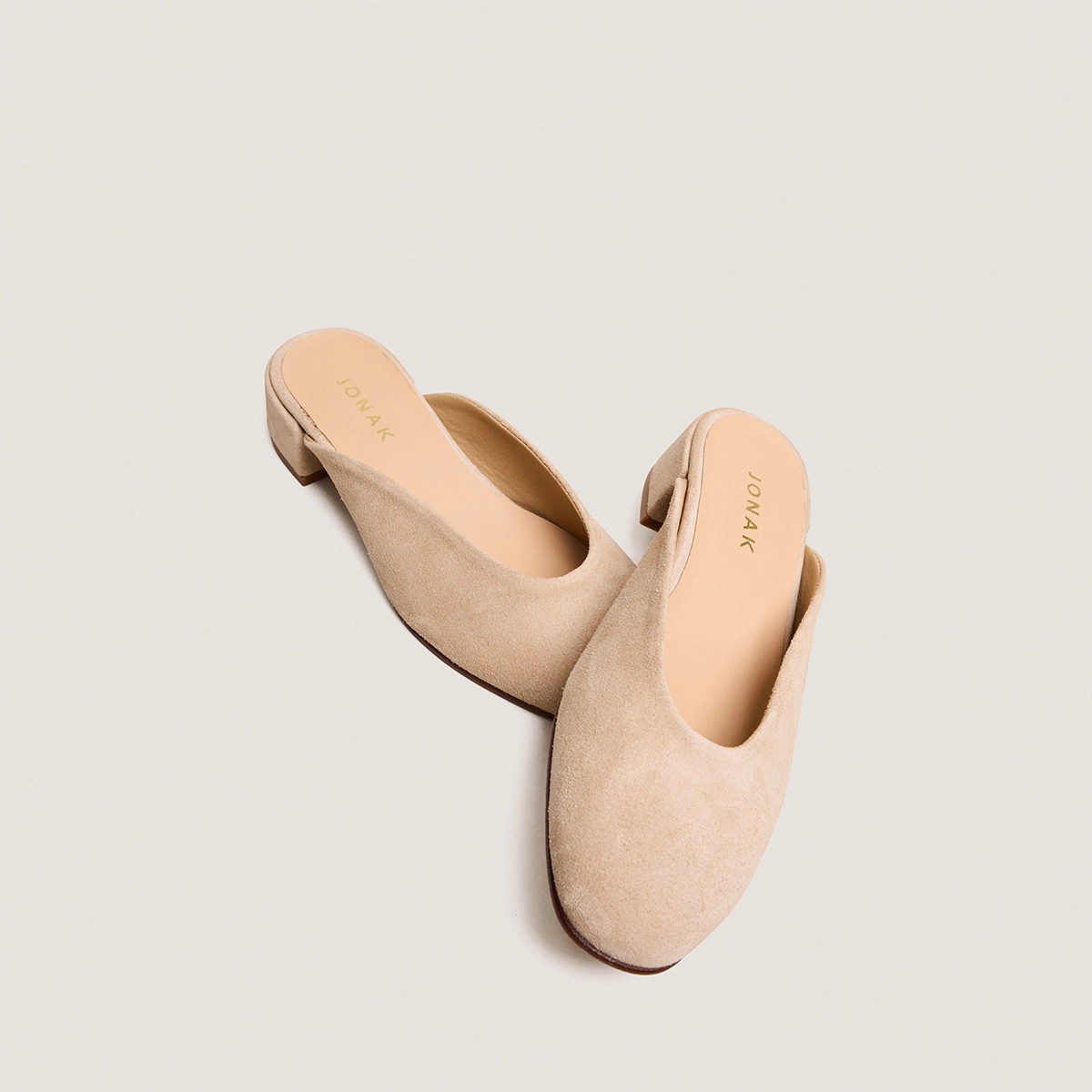Flat mules and low heel in black ivory split leather | NINE