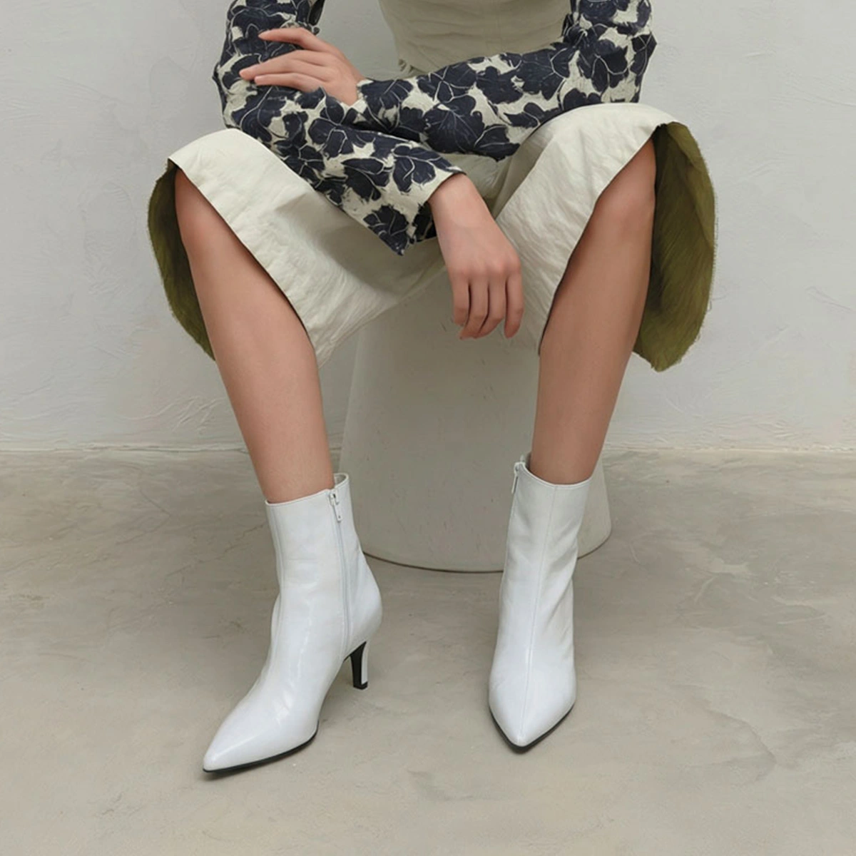Ankle boots with slim heels in white pleated patent leather | DIEMINA