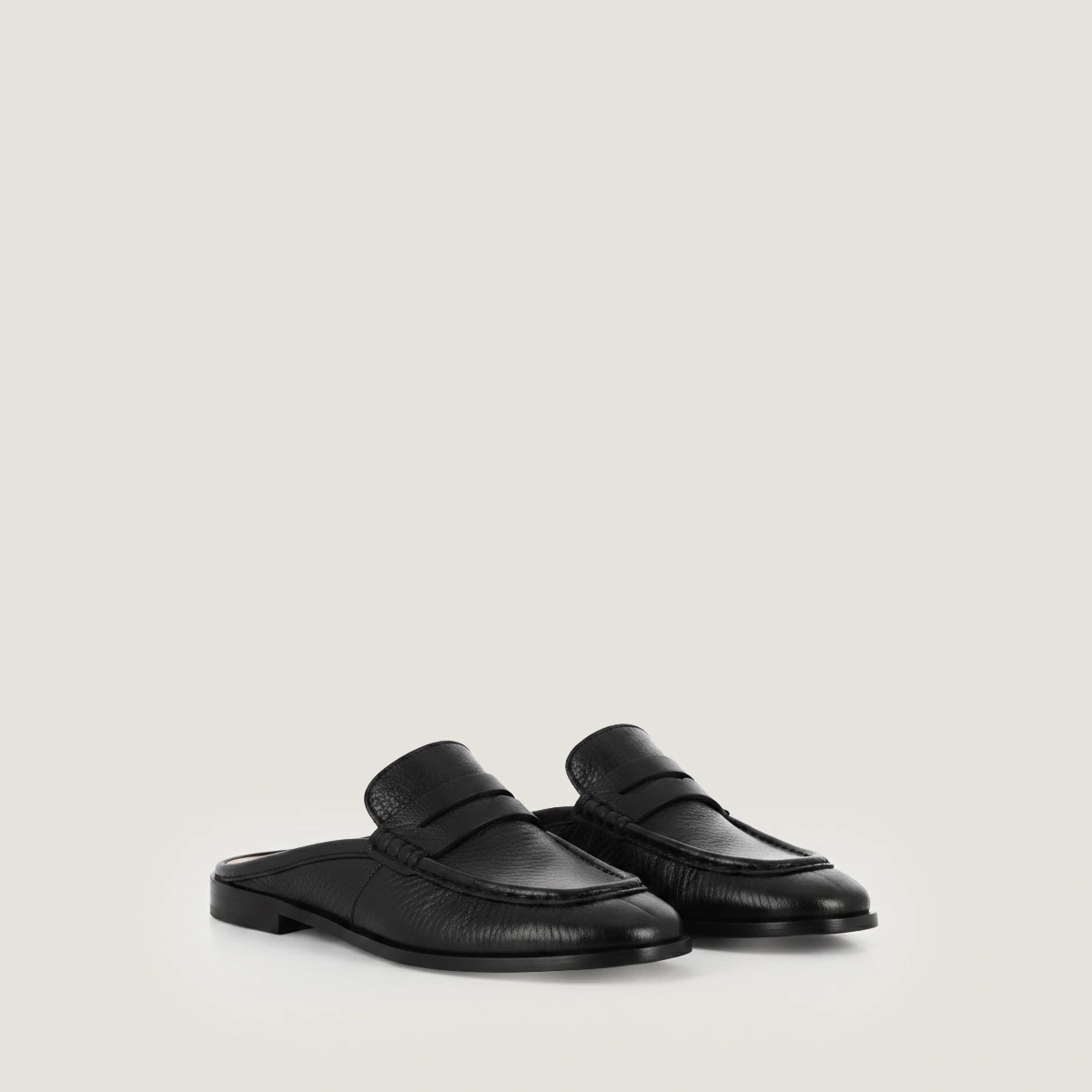 Backless loafers in black distressed leather | DEAUVILLE