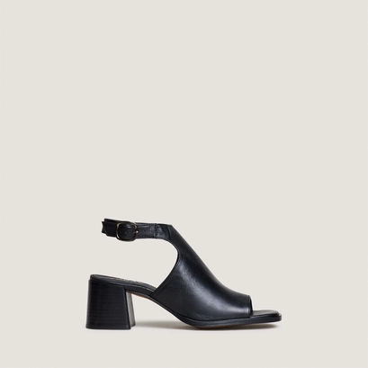 Heeled sandals with an open back in black leather | benita