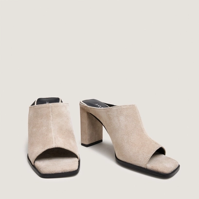 Heeled mules in ivory split leather | blair
