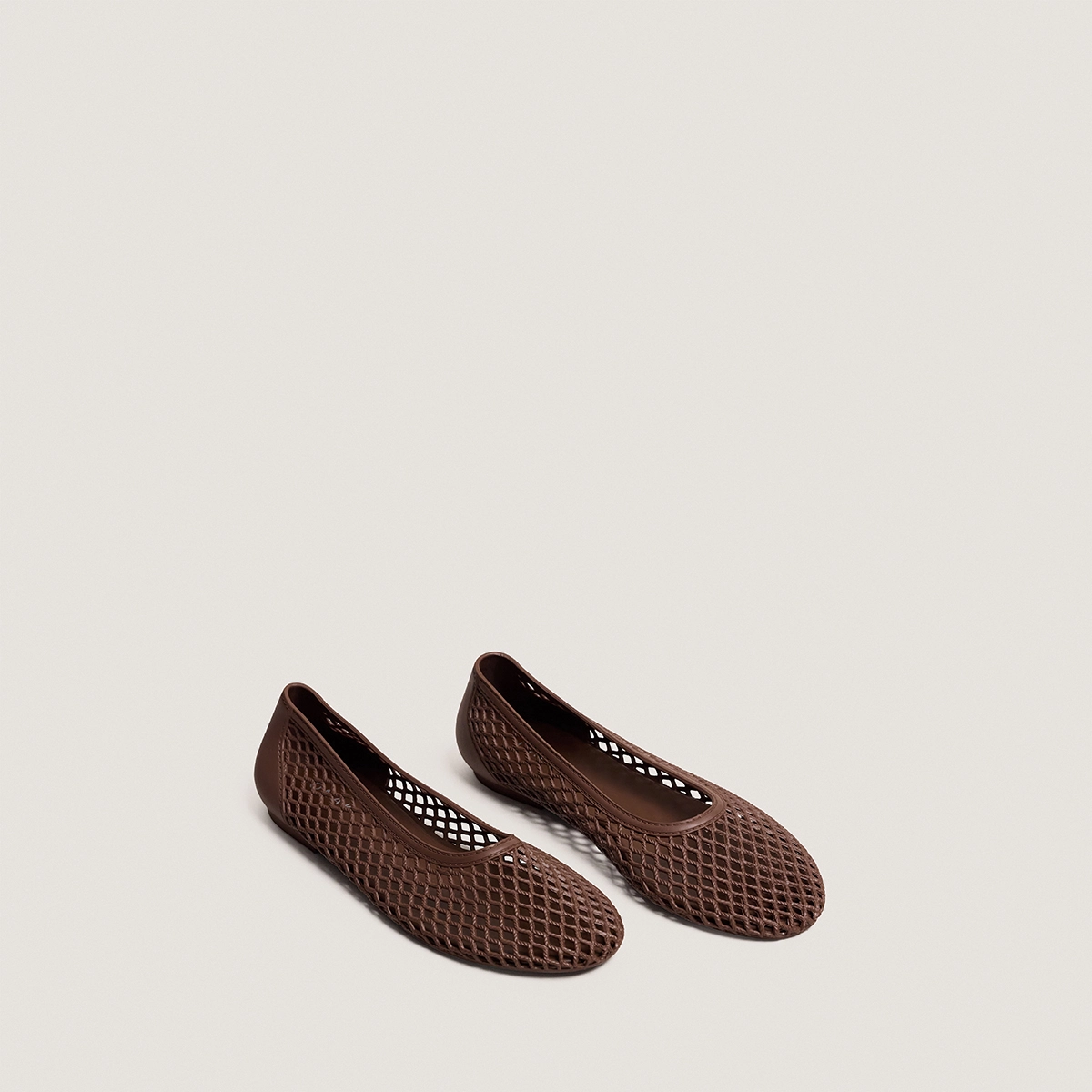 Perforated ballet flats in brown jelly | UGO