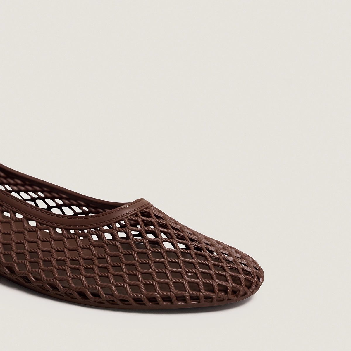 Perforated ballet flats in brown jelly | UGO