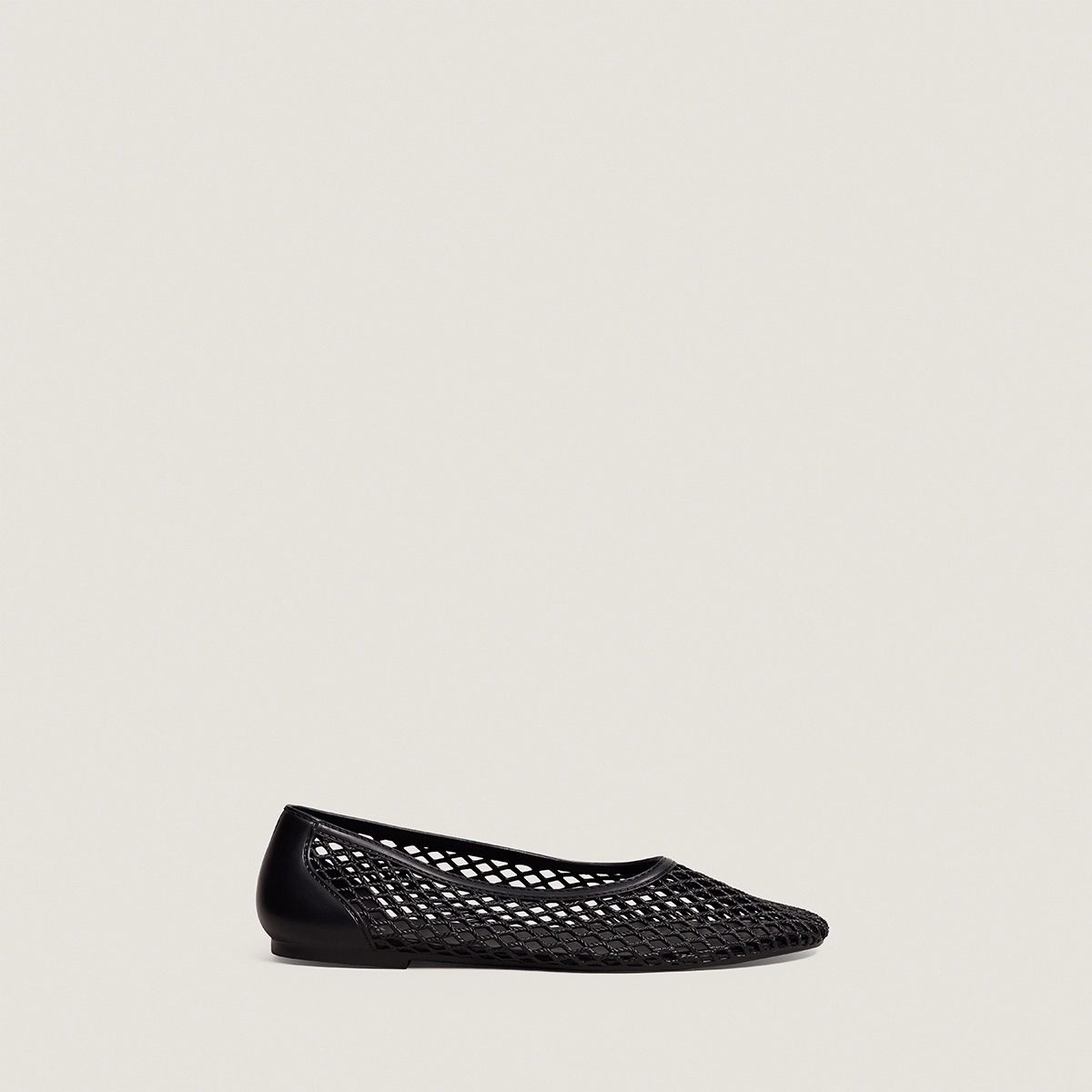Perforated ballet flats in black jelly | UGO