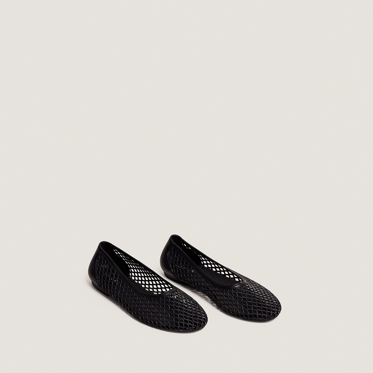 Perforated ballet flats in black jelly | UGO
