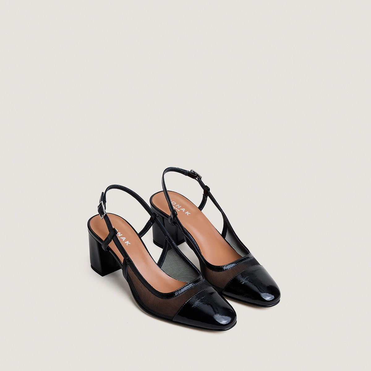 Heeled slingbacks in black pleated patent leather and black mesh | DRAG