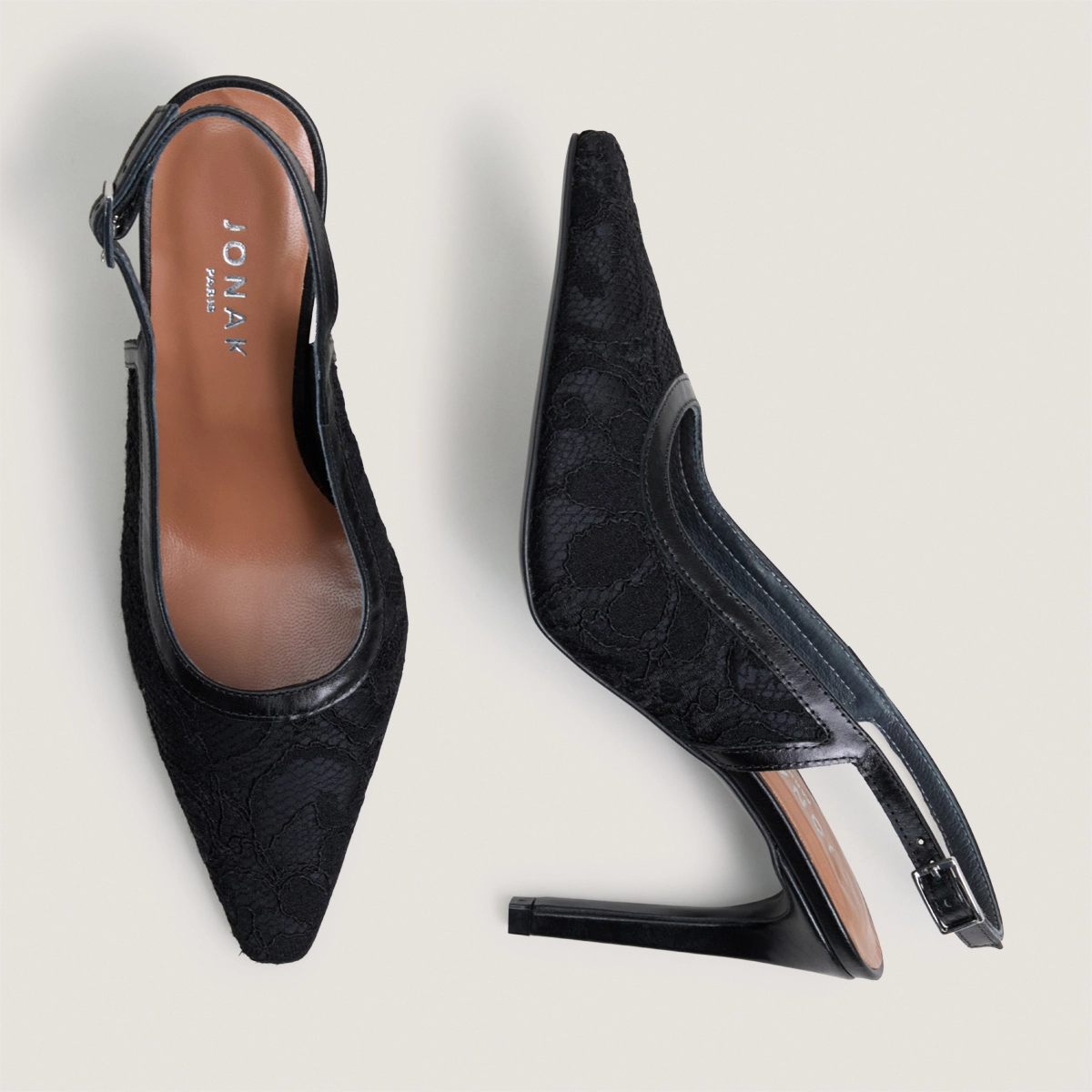 Pointed-toe slingback pumps in black lace and black leather | DAXA