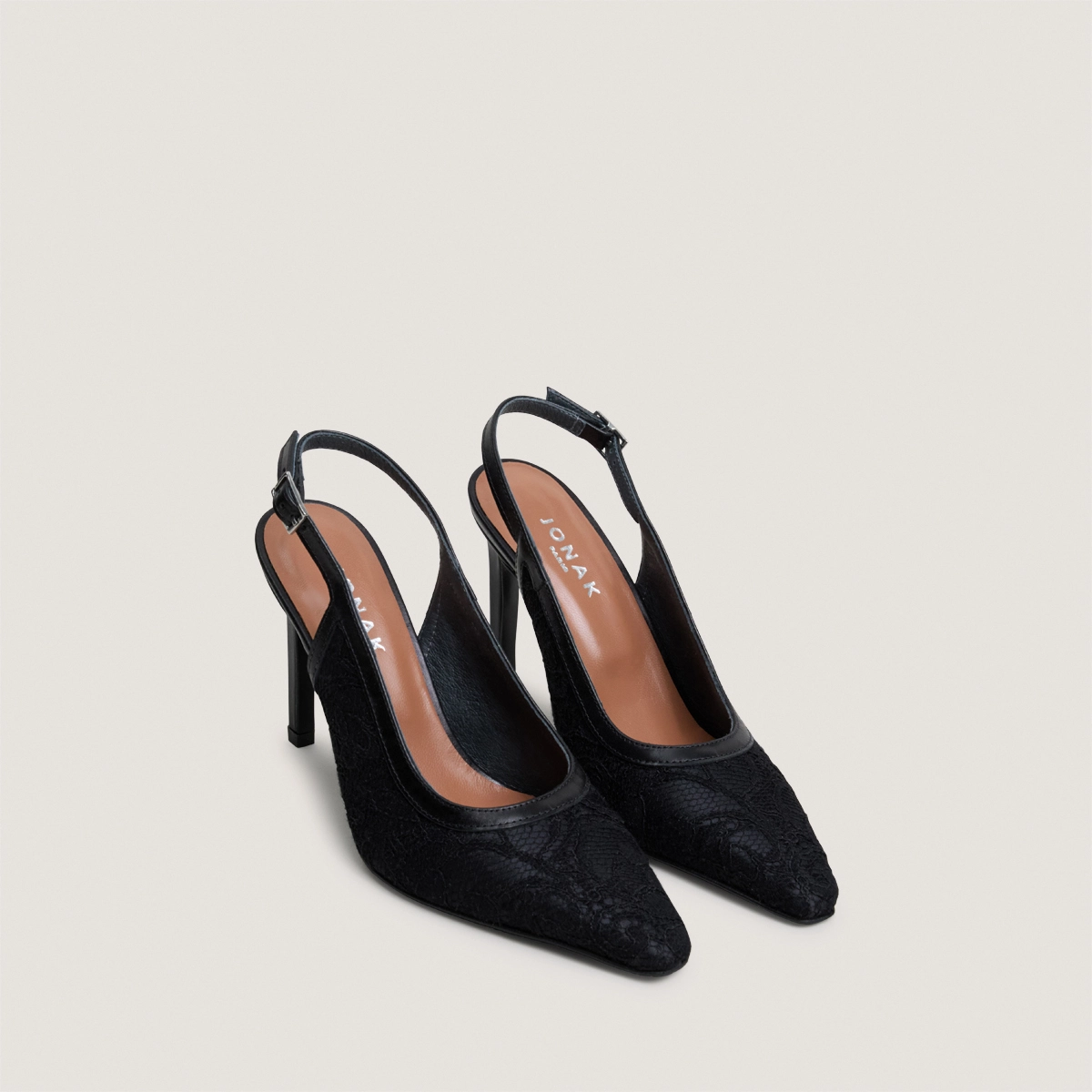 Pointed-toe slingback pumps in black lace and black leather | DAXA