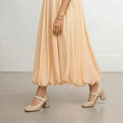 Square-toe heeled mary janes in beige and ecru patent leather | donzai
