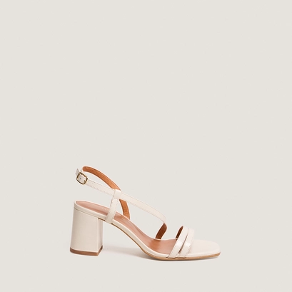 Heeled sandals with straps in ecru aged leather | vimy