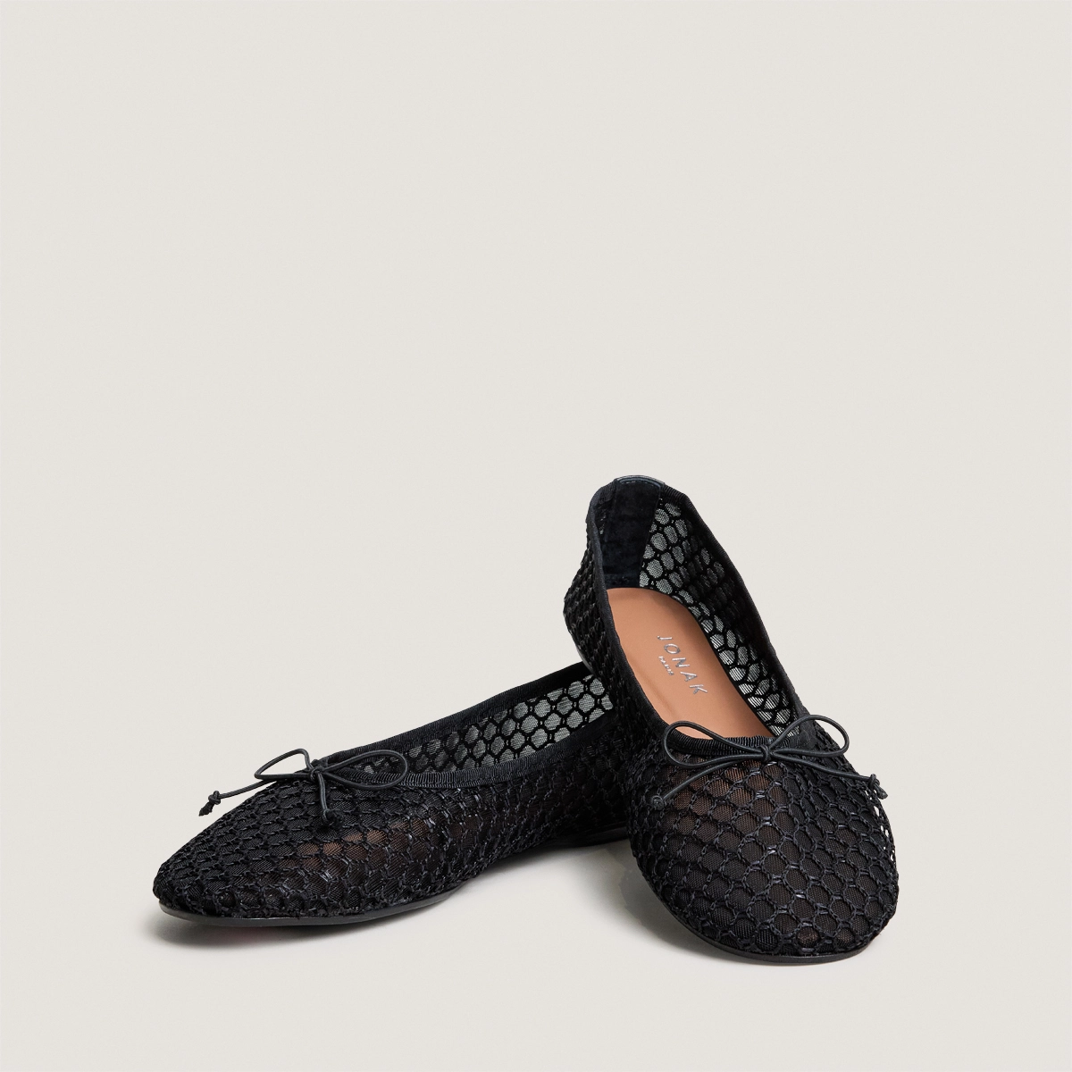 Low-heeled ballet flats in black mesh | DALESSIA