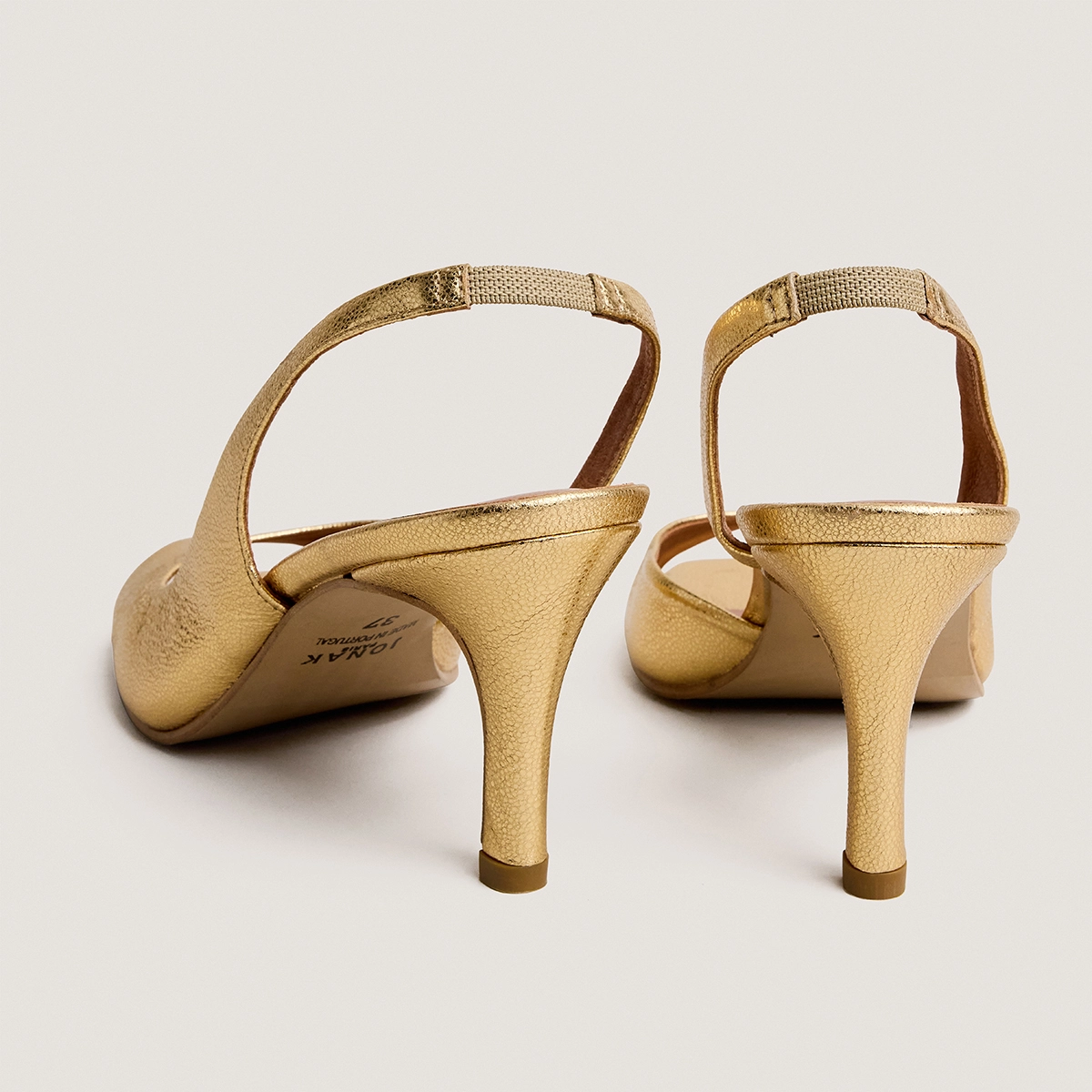 High-heel slingback pumps in gold crackled leather | DIRA