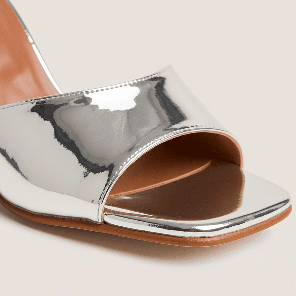 Heeled mules in silver mirror leather | VERTIGO