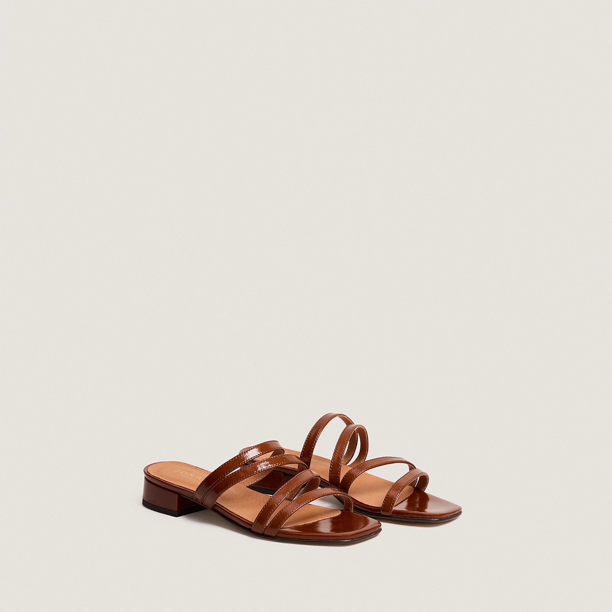 Low-heel mules with thin straps in caramel shiny leather | ALPILLES