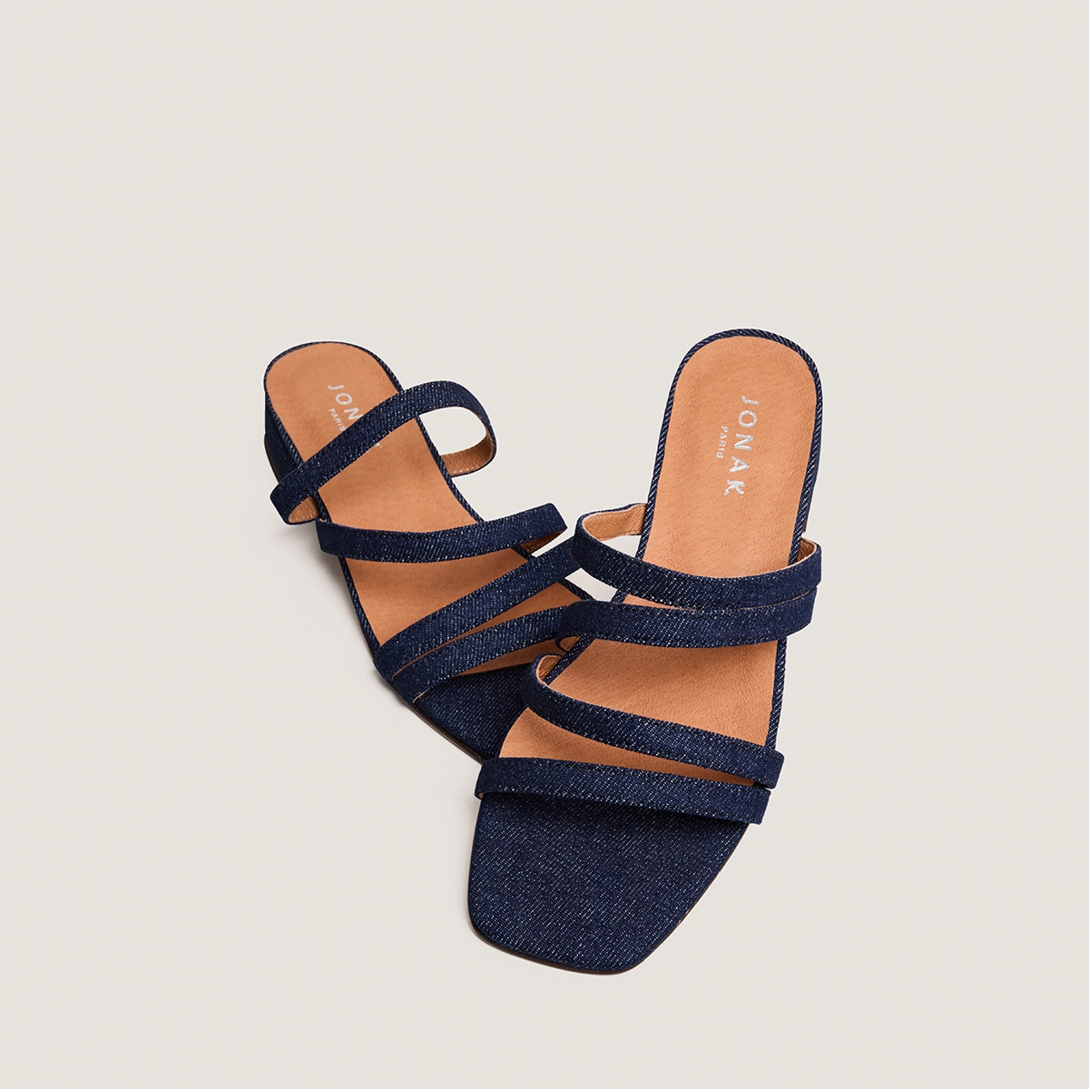 Low-heel mules with thin straps in navy blue denim | ALPILLES