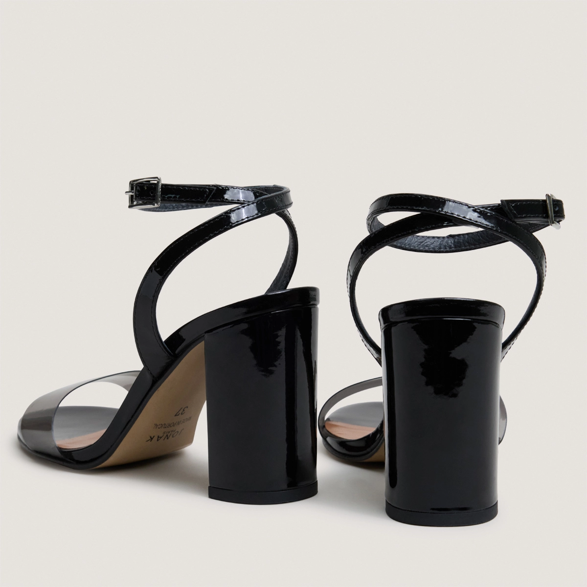 High-heel ankle-strap sandals in black vinyl and black patent leather | DANGER