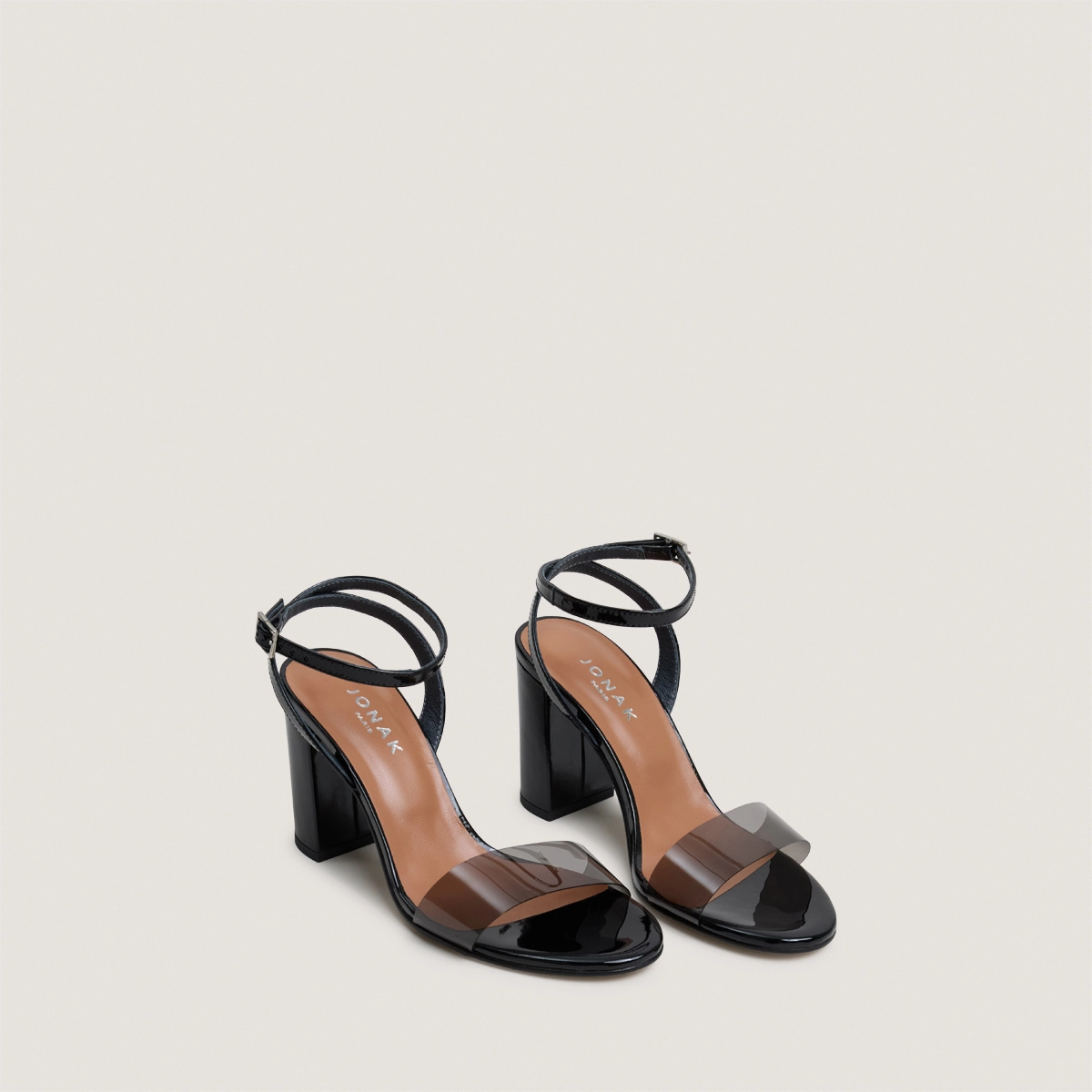 High-heel ankle-strap sandals in black vinyl and black patent leather | DANGER